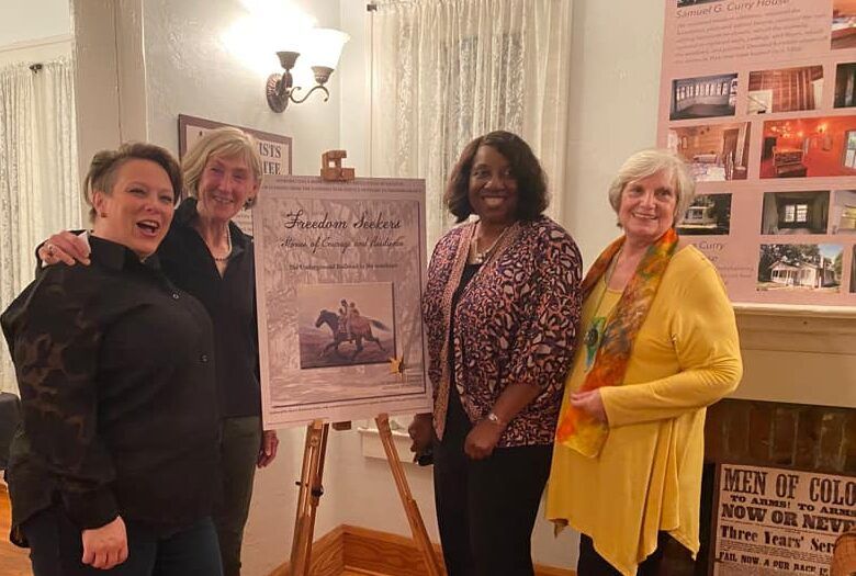 L-R: Jean Lammie, Sherry Robinson Svekis, Sheri Jackson (our National Network to Freedom advisor), and Elizabeth Neily, all unveil the cover of the book inside our Visitors Center exhibit gallery.
